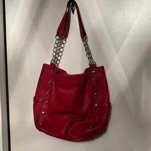 Red shoulder bag with stud detail